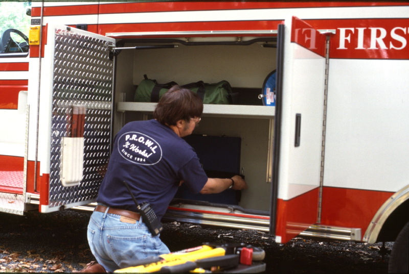 historic_photos/images_large/2004-10_1_Kirk_repairing_ambulance_151-1.jpg